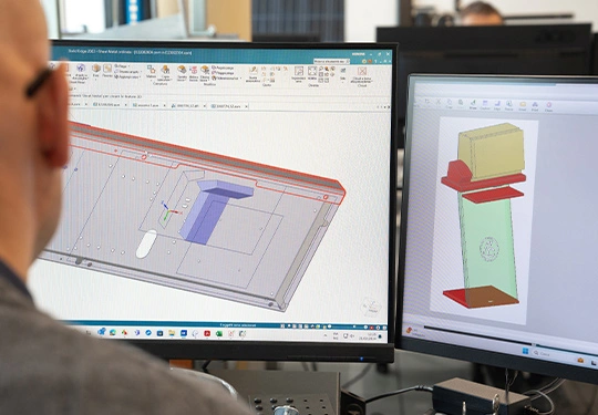 Co-designing sheet metal molds